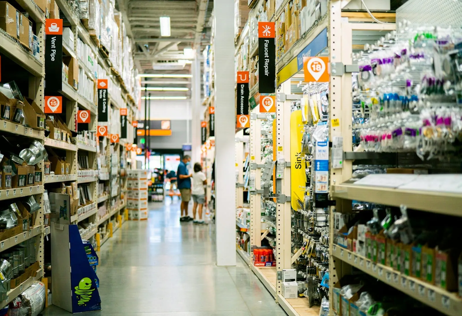 A store aisle with stocked shelves